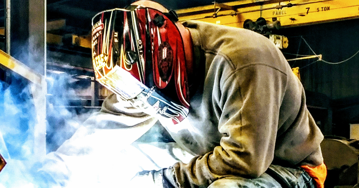 A man welding.